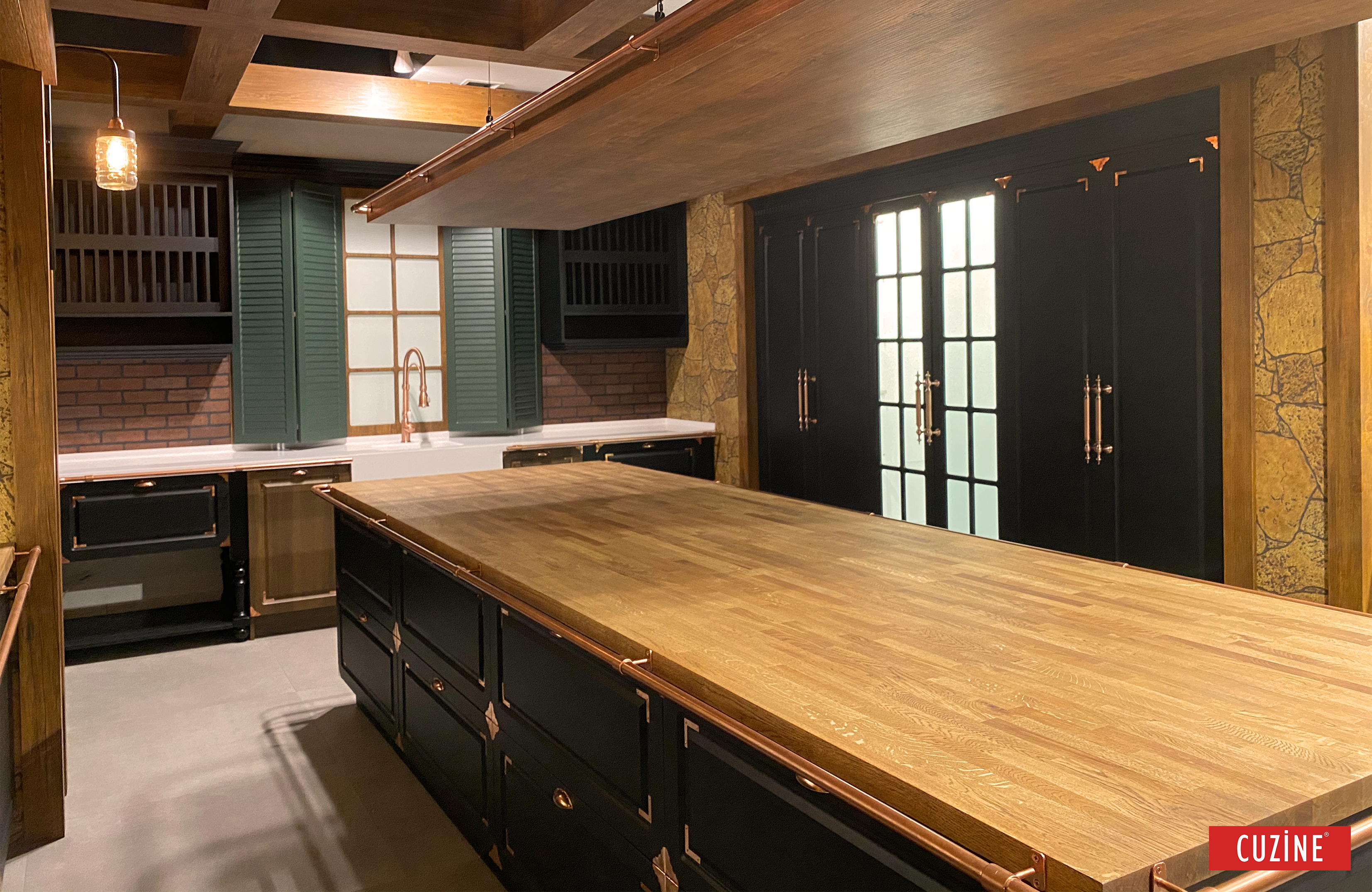 Modern kitchen with wooden island and black cabinets